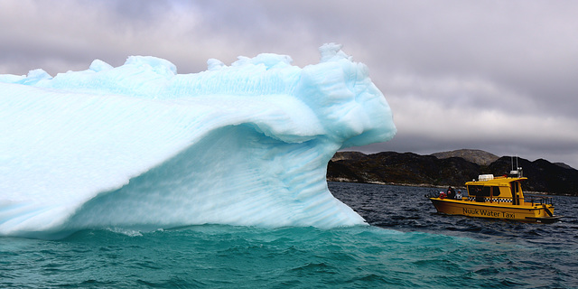 Eisberg mit Besucher