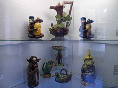 Displayed pottery pieces.