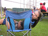 Now you see her ~~  photo# 1 ~~  oldest G/daughter   ...  her idea of watching a baseball game :)