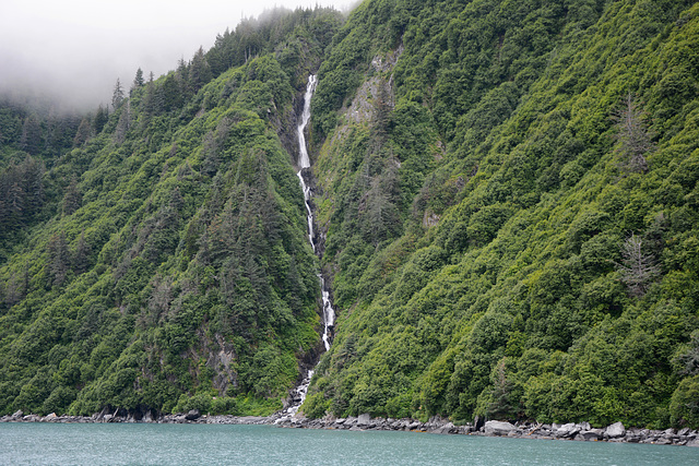 Alaska, Waterfall Cascade from Northern Rocks of Valdez Arm
