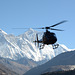 Khumbu, Helicopter on background Everest and Lhotse