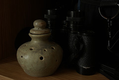 Potpourri jar with binoculars