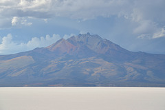 Bolivia, Volcano Tanupa (5400m) from Surface of the Salar de Uyuni