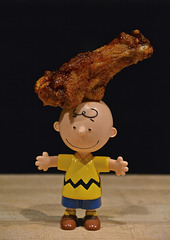 Charlie Brown Demonstrates the Art of Balancing Buffalo Chicken Wings on One's Head