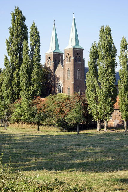 Church behind poplars