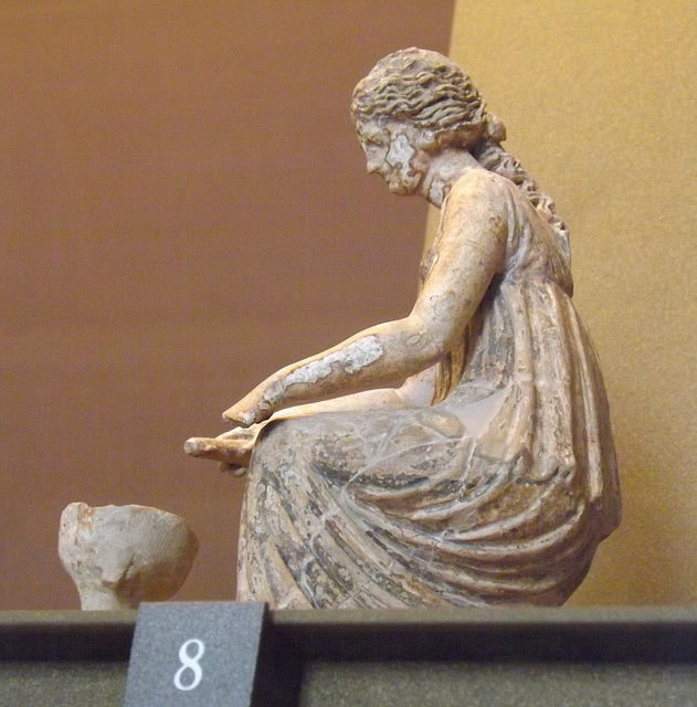Young Woman with an Alabastron Making an Offering Terracotta Figurine in the Louvre, June 2013