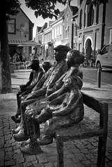 A family on a bench