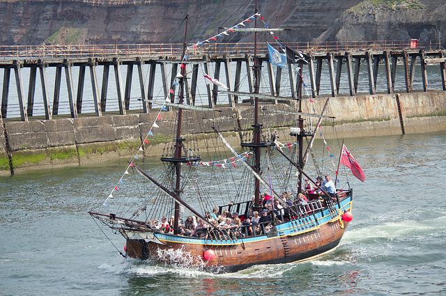 The Bark Endeavour, disguised as a pirate ship, leaves Whitby Harbour