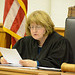 The judge begins to read the jury's verdicts