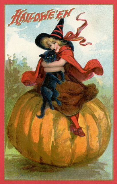 Halloween—Witch with a Black Cat on a Pumpkin