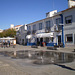 Water jets and terrace in the square.
