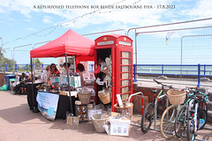 A repurposed telephone box beside eastbourne pier - 17 8 2023