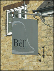 boring grey Bell sign