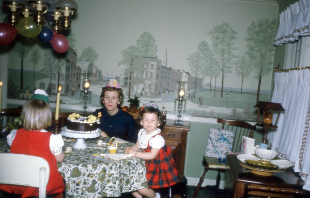 Birthday Party with Cake, Candles, Balloons, Hats, and Eyes Closed, 1965