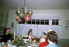 Birthday Party with Cake, Candles, Balloons, and Hats, 1965