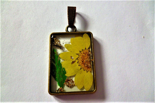 Yellow flower and gold leaf