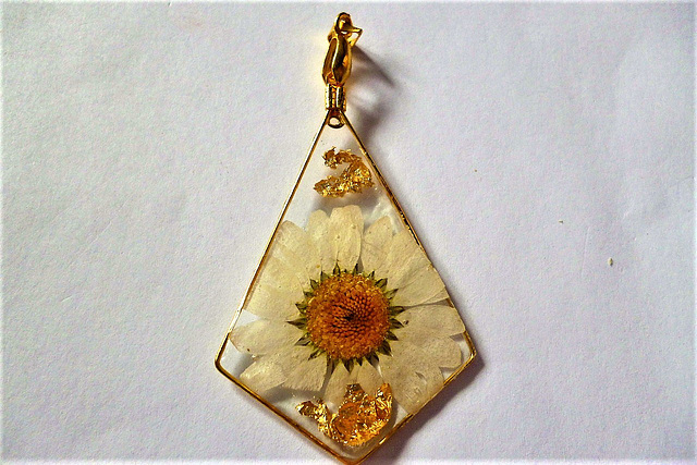 White flower and gold leaf