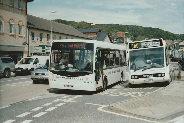 Mid Wales KX07 KNW and Langleys Coaches MX56 NLO in Aberystwyth - 27 Jul 2007