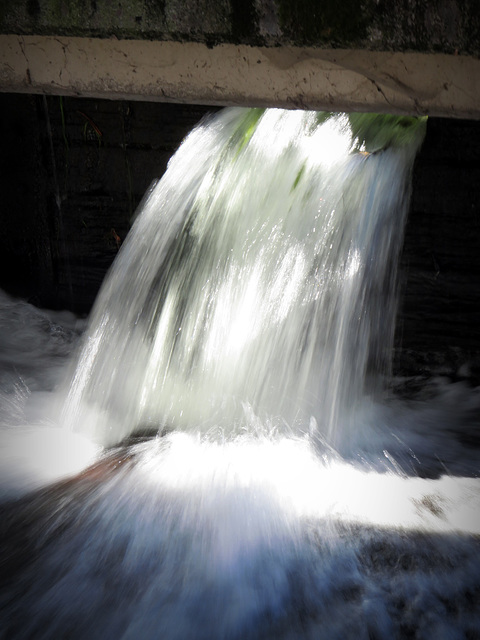 Waterfall of the Wurm stream in Paul-Diehl-Urban Park Pasing.