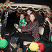 My golf cart in the Christmas Parade, decorated and driven by a grand daughter :))  loaded with her friends :)