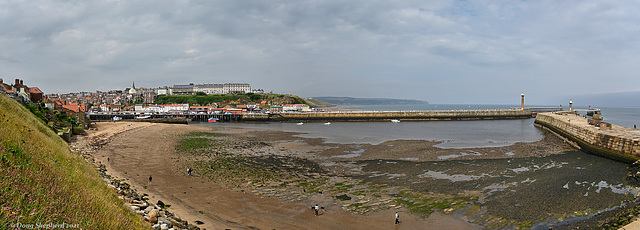 Whitby Harbour and Tate Hill beach at low tide