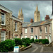 Truro back street, fresh fish advert and cathedral.