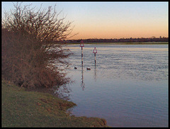 flood markers at sunrise