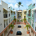 Dominican Republic, Narrow Street Passage between Cottages at the Ocean Blue & Sand Hotel