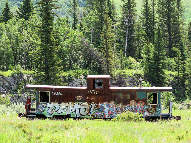 A burnt out caboose on way to Kananaskis