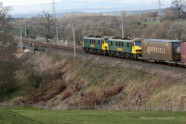 Freighliner class 90`s 90041+90016 with 4S44 11:52 Daventry-Coatbridge Intermodal at Great Strickland 13th April 2019.