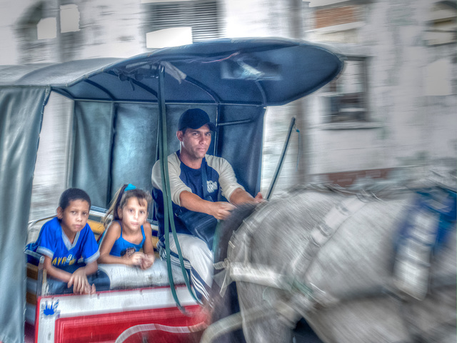 Horse drawn carriage in the street of Santa Clara, Cuba