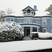 White blanket, blue house