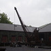 Crane and warehouses.
