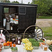 Hutterites selling produce in Bruce Mines, Ontario.