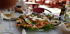 Sea food for two - lunch at outdoor table.