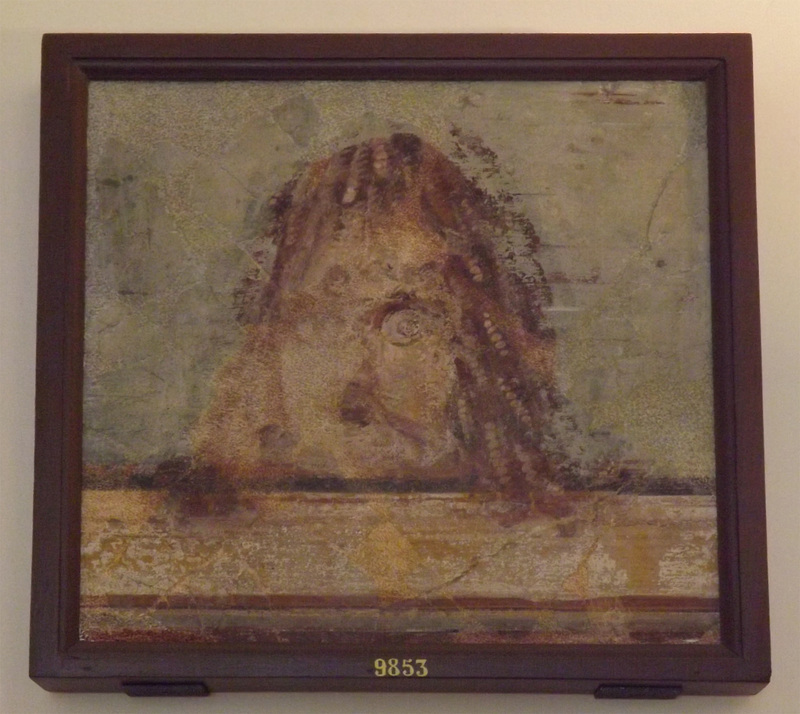Tragic Mask on Cornice, Wall Painting from Pompeii in the Naples Archaeological Museum, July 2012