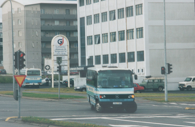 A Guðmundur Jónasson Mercedes-Benz mini-coach seen departing from the GJ premises in Borgartún, Reykjavík, Iceland - 28 July 2002 (496-17A)