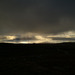 Misty sunset over Raasay and Skye from Bealach na Ba