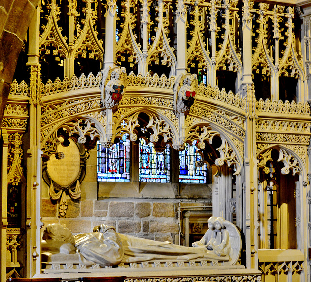 Ornate carving and tomb.