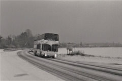 An Ambassador Travel MCW Metroliner on the A11 at Barton Mills – 6 Jan 1985 (6-9)