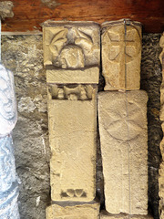 bakewell  church, derbs (92)recessed effigy amongst the cross slab collection in porch, mostly found when the late c13 /early c14 central tower was taken down.