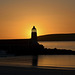 Port Logan Lighthouse at sunset