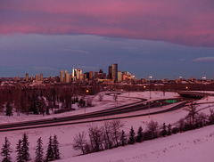 Downtown Calgary bathed in sunrise pink