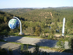 Globe and rocket Vega, of the European Space Agency.