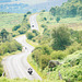 A motorcyclist approaches 'Toads mouth' on the A6187 towards 'Hathersage' - Derbyshire..