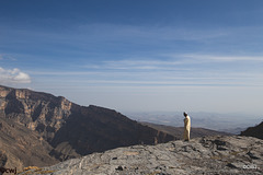LR-1714 - Alone with his thoughts on the edge of the Wadi Shams Canyon, staring into the abyss...