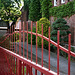 Red iron gate of a church