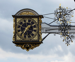The projecting clock of the Grade 1 listed historic Guildford Guildhall.