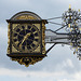 The projecting clock of the Grade 1 listed historic Guildford Guildhall.