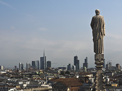 From one spire the Cathedral observes the new Milano, what to think?